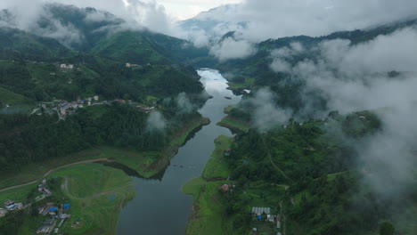 aerial view of a serene river valley in the mountains