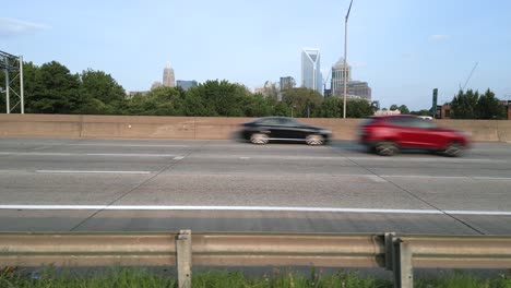 Aerial-Drone-Flying-Parallel-to-Cars-Driving-on-Charlotte,-North-Carolina-Interstate-77-Traffic