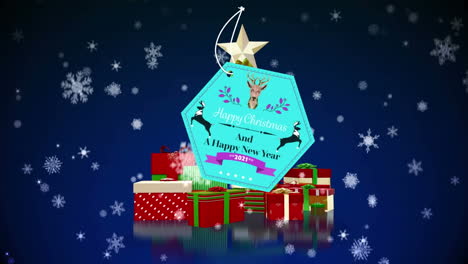 animación de saludos de navidad y nieve cayendo sobre el árbol de navidad con regalos