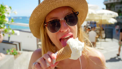 a young woman enjoying a cone of gelato on holiday