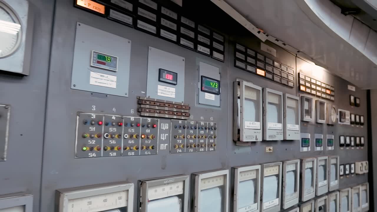 Control panel of an old Soviet coal-fired power plant with indicators, voltmeters, switches and displays