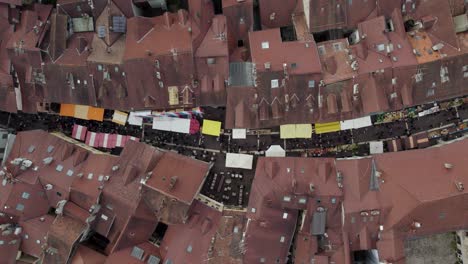 Alley-Streets-and-Building-Rooftops-of-Old-Town,-Annecy-France---Aerial-Top-Down