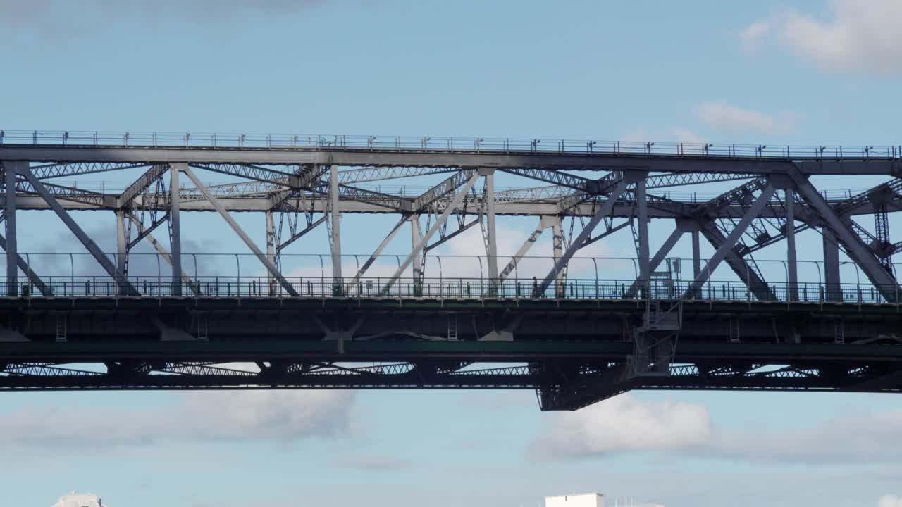 Pedestrian bridge over river in Brisbane Australia, steel infrastructure