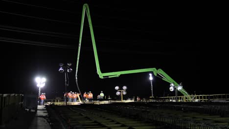 construction crew pours concrete ws