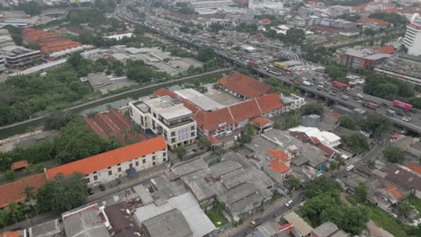 Heavy-Traffic-In-Jakarta-Near-Batavia-At-Midday-Trucks-And-Cars-Heading-In-Opposite-Directions