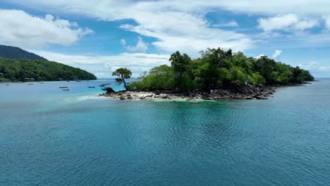 Stunning-coastline,-crystal-clear-waters,-serene-scenery,-aerial-parallax