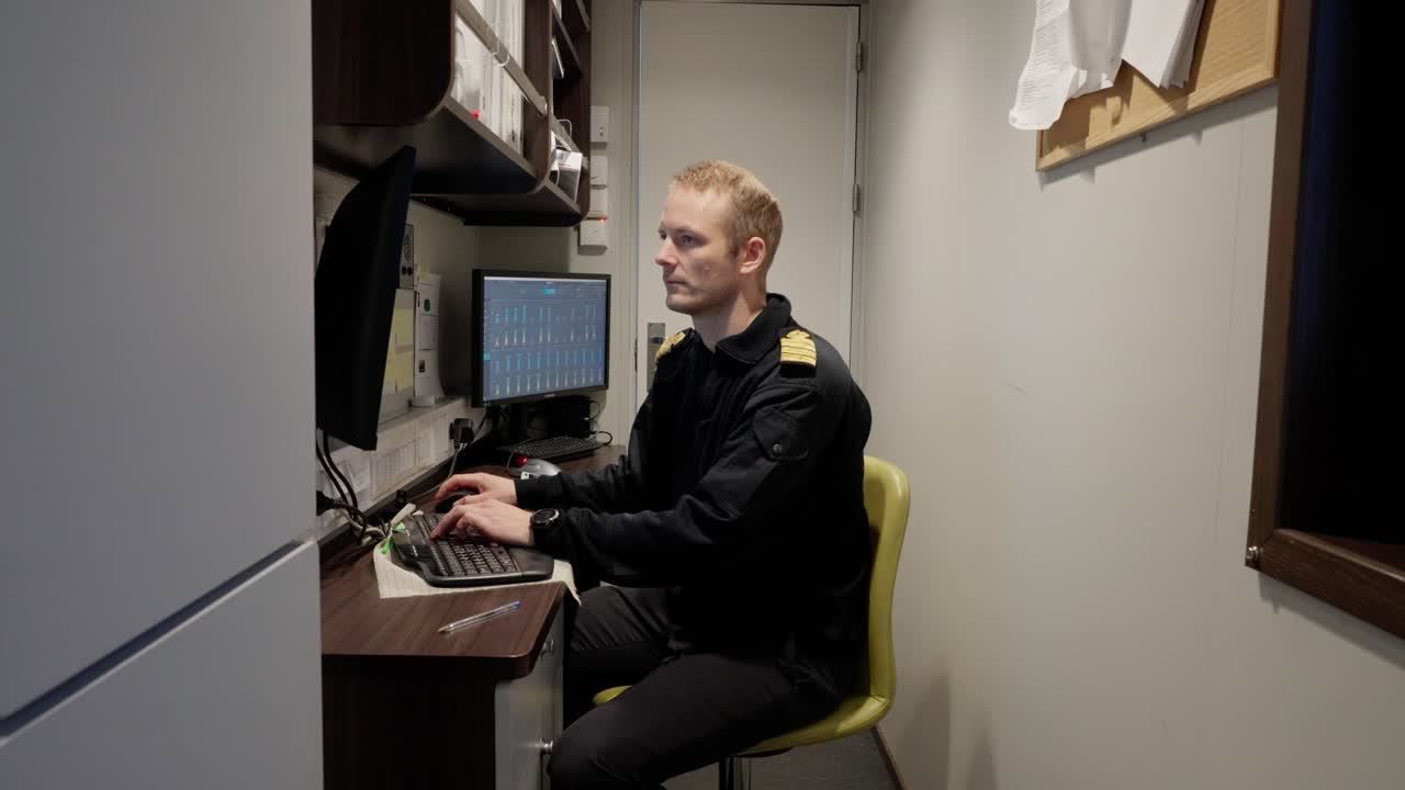 Premium stock video Nautical command center, captain's compact office