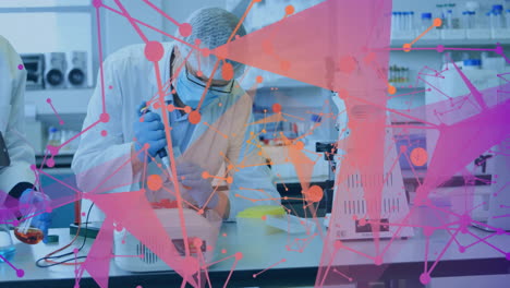 animation of network of connections over caucasian male scientist in laboratory