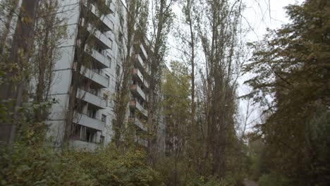 abandoned apartment building at chernobyl nuclear power plant zone in pripyat, ukraine during autumn