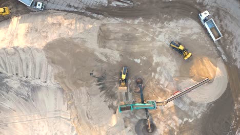 Aerial-time-lapse-hyperlapse-of-sand-quarry,-industrial-extraction-of-sand-for-construction-industry