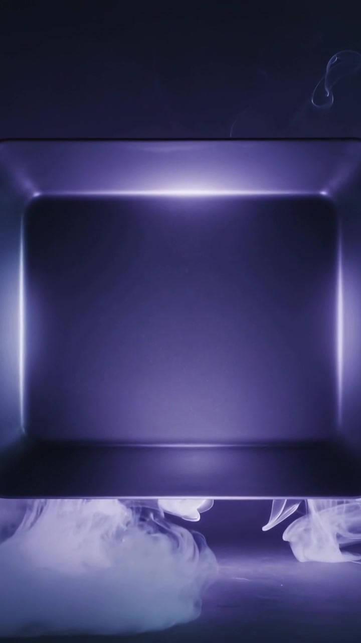 Vertikal video: Damp stiger op nedefra og fylder et forsænket LED-display på en base i et studie for at skabe effekt.