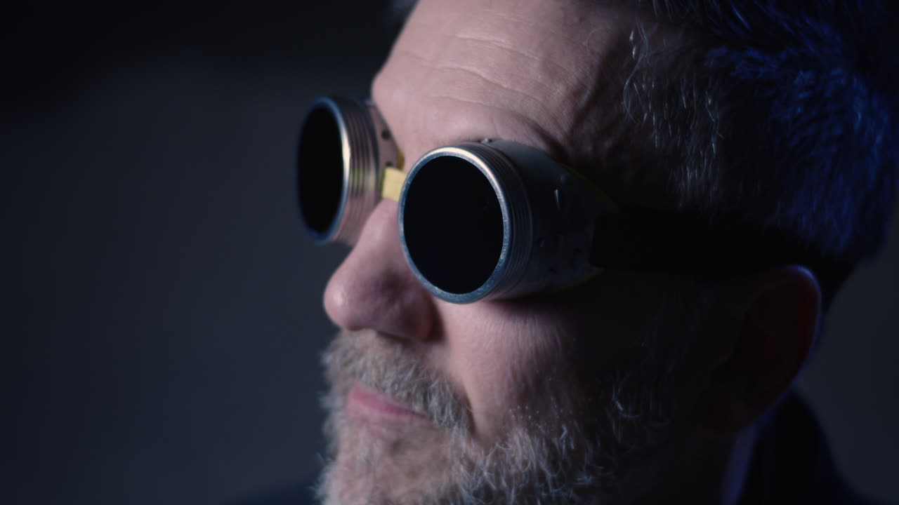 Man Wearing Welding Goggles