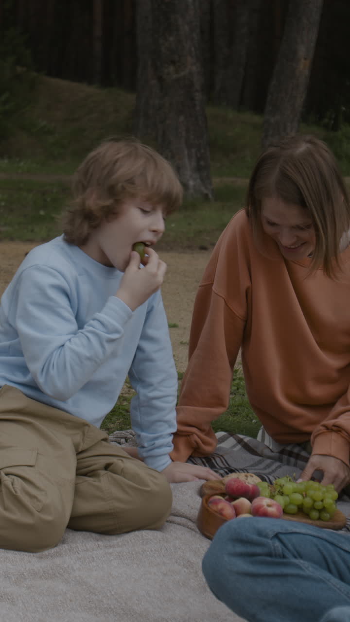 People having a picnic outdoors