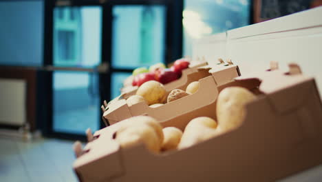 natural ripe fruits and vegetables in farmers market crates