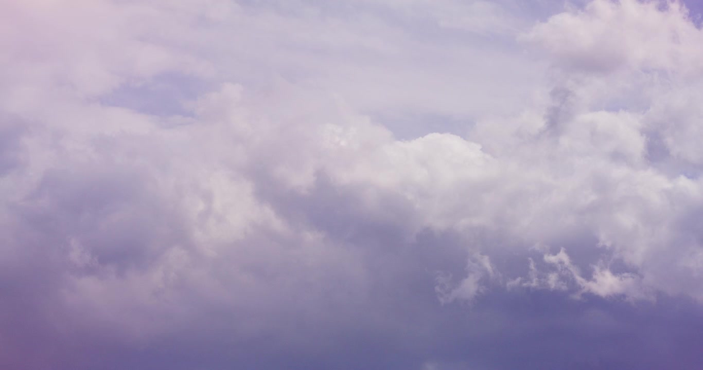 Time Lapse of Clouds Transitioning from Dark to Bright Blue Sky