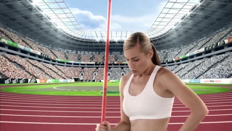 Female-athlete-standing-with-javelin-throw