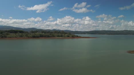 Scenic-Drone-Flyover-Arenal-Lake-Lagoon-Costa-Rica,-National-Park-On-Summer-Day,-4K-Aerial