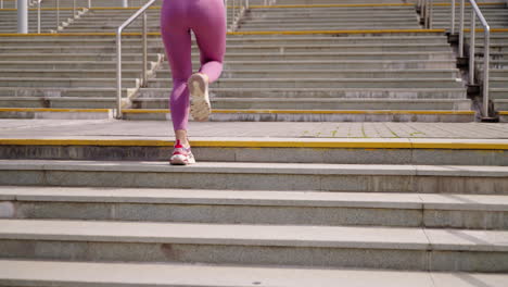 woman running up stairs