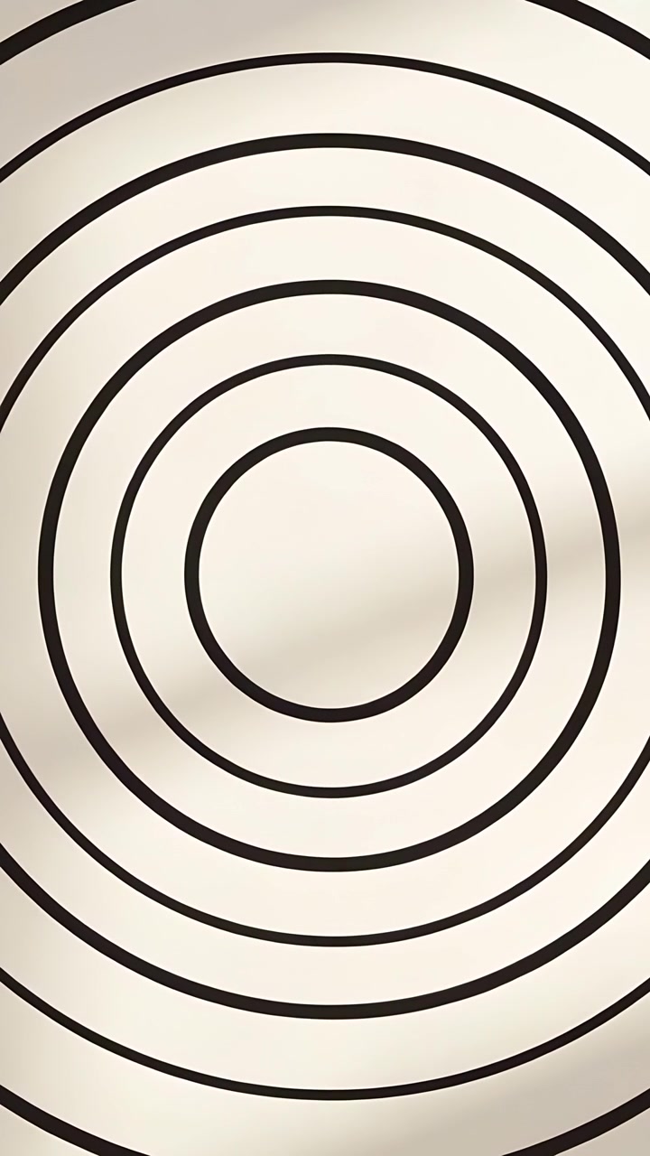 Vertical video: Shifting light making shadow bands crossing concentric black rings on cream wall