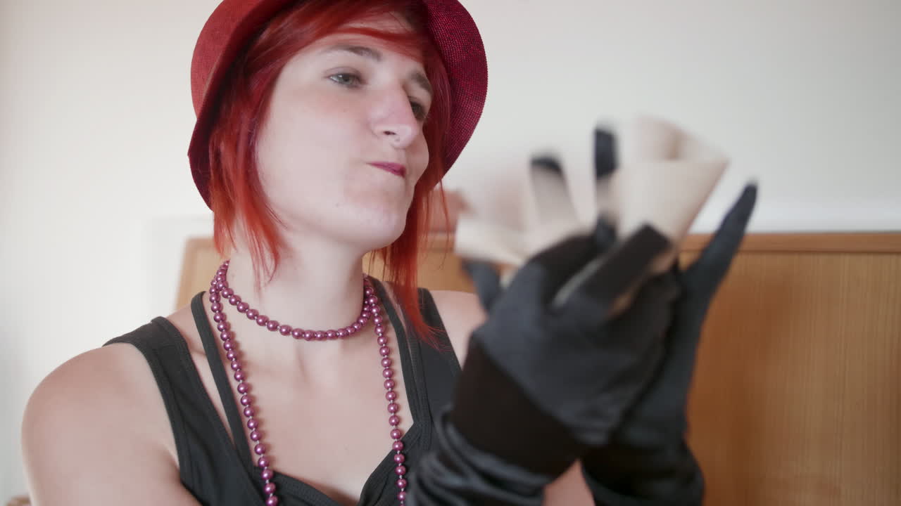 Golden Twenties - Young Woman crumpling Piece of Paper in Anger