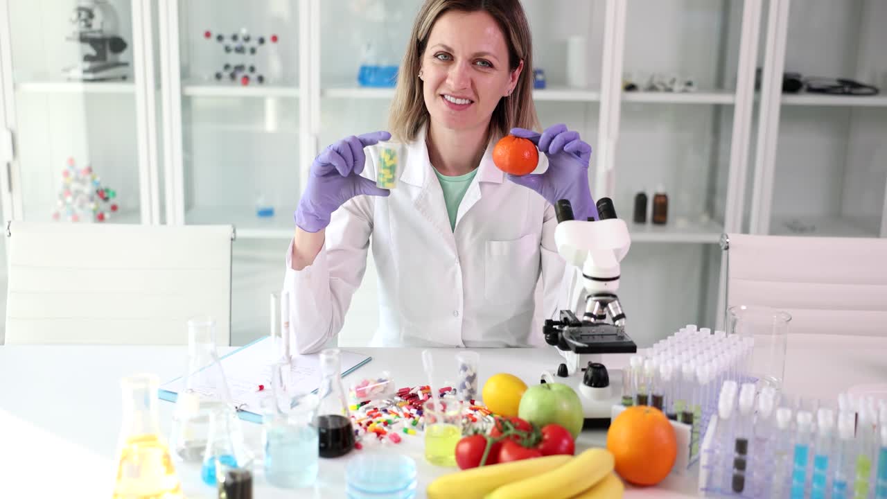 Scientist comparing natural fruits with nutritional supplements in a laboratory