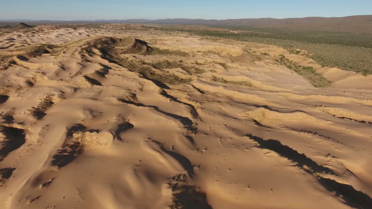 Aerial View of Sand Dunes in a Desert Landscape