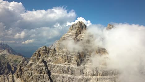 beautiful aerial of three peaks of tre cime di lavaredo mountain top peaks on a sunny day belluno, dolomite, italy