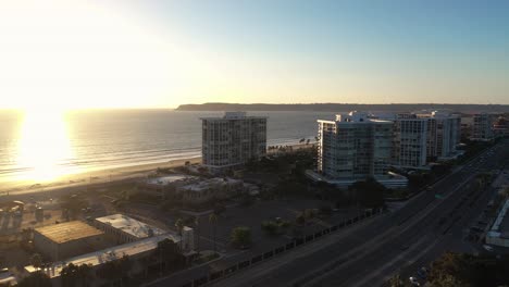 still 4k aerial video overlooking coronado shores condos during sunset summer 2023 with beautiful golden and blue skies