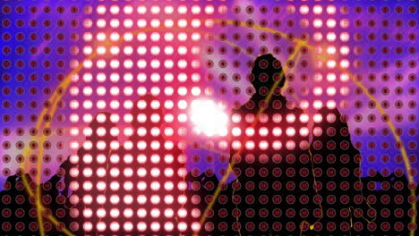 two dj silhouettes performing behind mixing console on vibrant led light wall in flat design