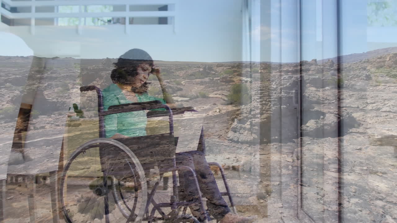 Using laptop, woman in wheelchair viewing animation over rocky landscape background