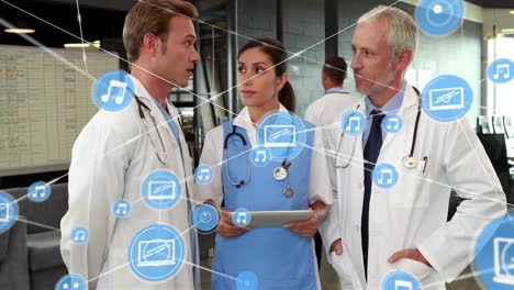 Animation-of-network-of-connections-with-icons-over-diverse-doctors