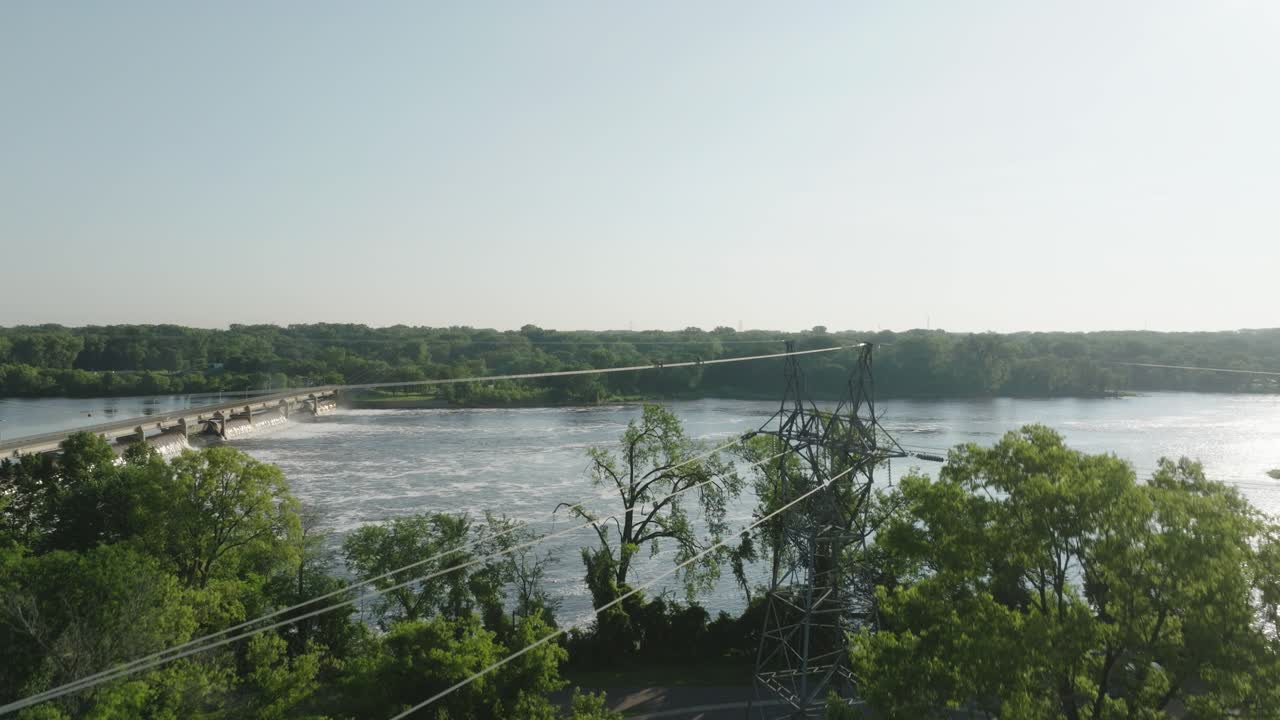 A Geothermal Well Reveals A Hydroelectric Dam At Coon Rapids Dam Regional Park In Minnesota, USA. Aerial Ascending Shot