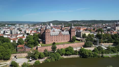 johannesburg castle from above, drone in half circle and aschaffenburg town in germany