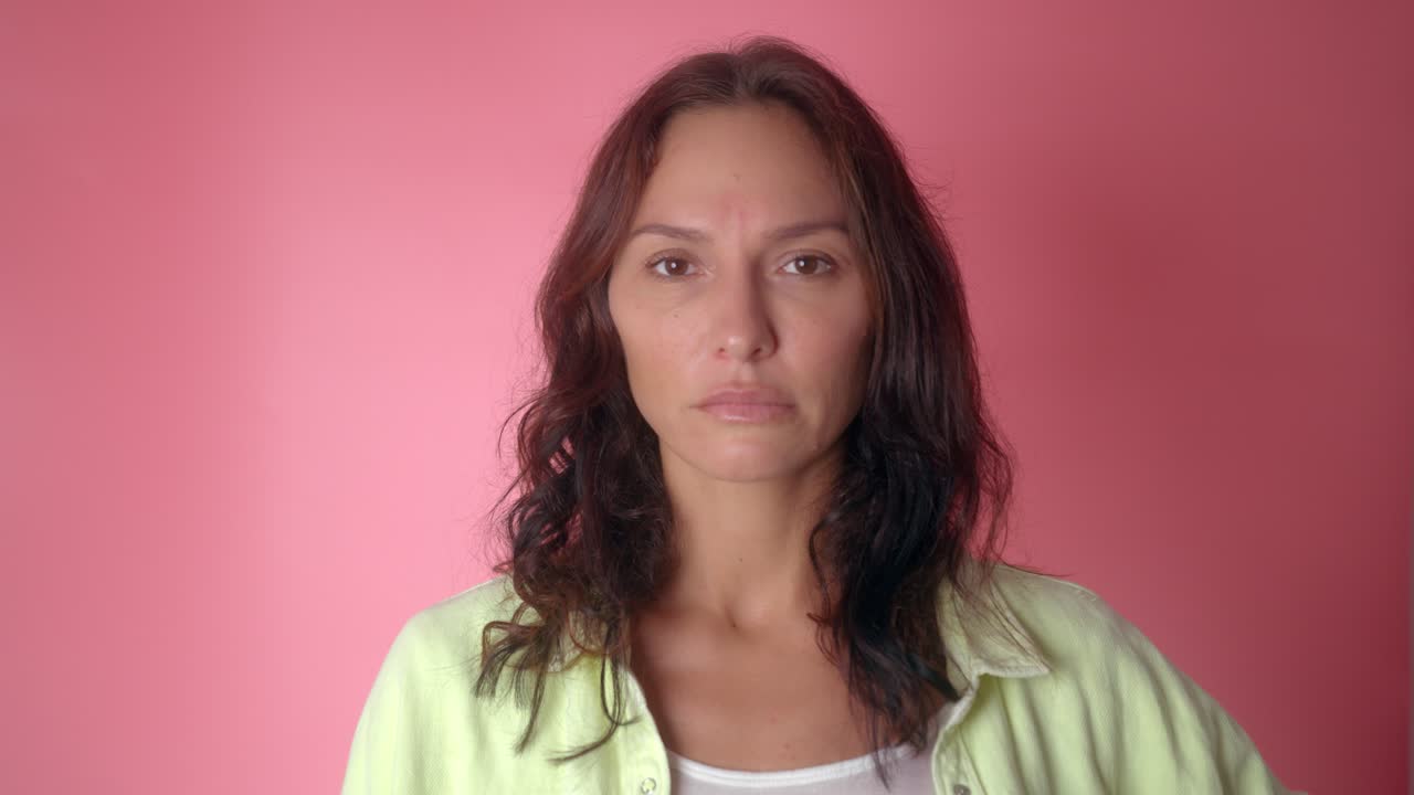 Woman covering her face