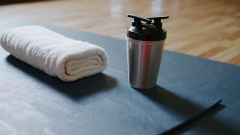 workout essentials on a yoga mat