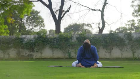 Young-Indian-man-doing-yoga-in-morning