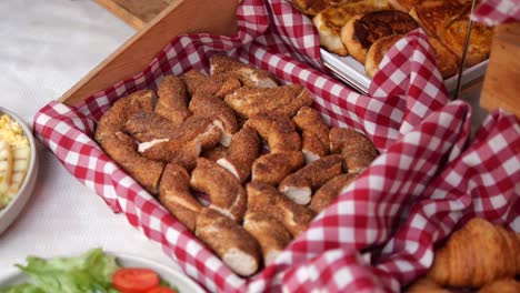 breakfast buffet with bread and pastries