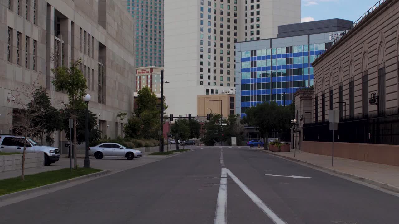 Cars rive On Denver City Street