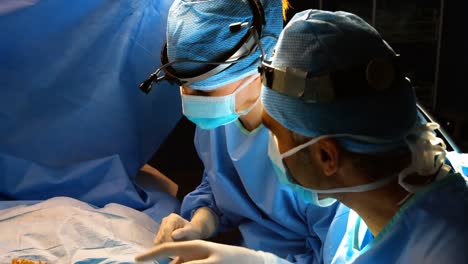 surgeons interacting in operation room