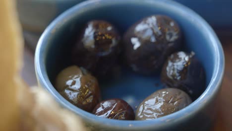 olives in small blue bowl