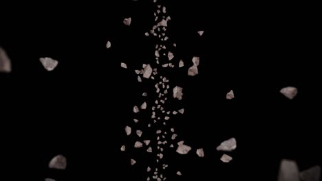 volando muchas piedras de roca en fondo negro. explosión de salpicaduras rotas. concepto de desafío. animación 3d de salpicadas de piedra girando. animación de bucle.