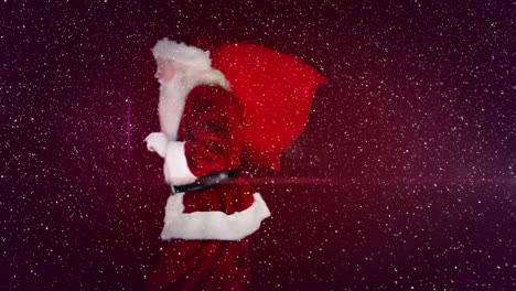 video composition with falling snow over  santa walking with sack on his back