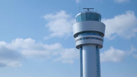 air traffic control tower against the blue sky in the airport