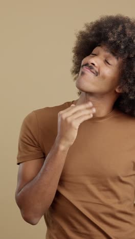 a man with an afro and mustache displaying various emotions and expressions