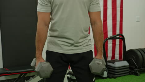 man train on sports training equipment in a fitness gym