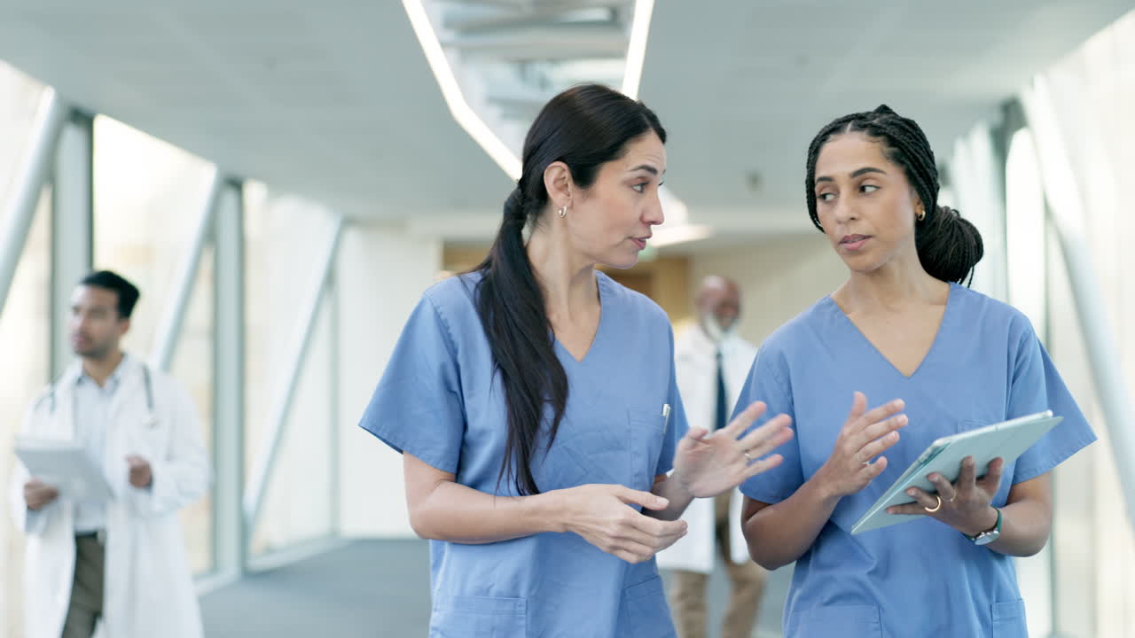Teamwork, tablet or nurses speaking of results