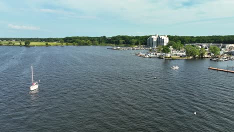 high angle drone shot of marinas and docks on the water