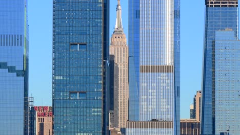 manhattan skyline buildings close up during bright day with clear blue sky