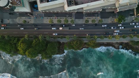 aerial top down shot of busy traffic on george waingington avenue in santo domingo