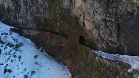 walking path inside the wall of a mountain in madeira